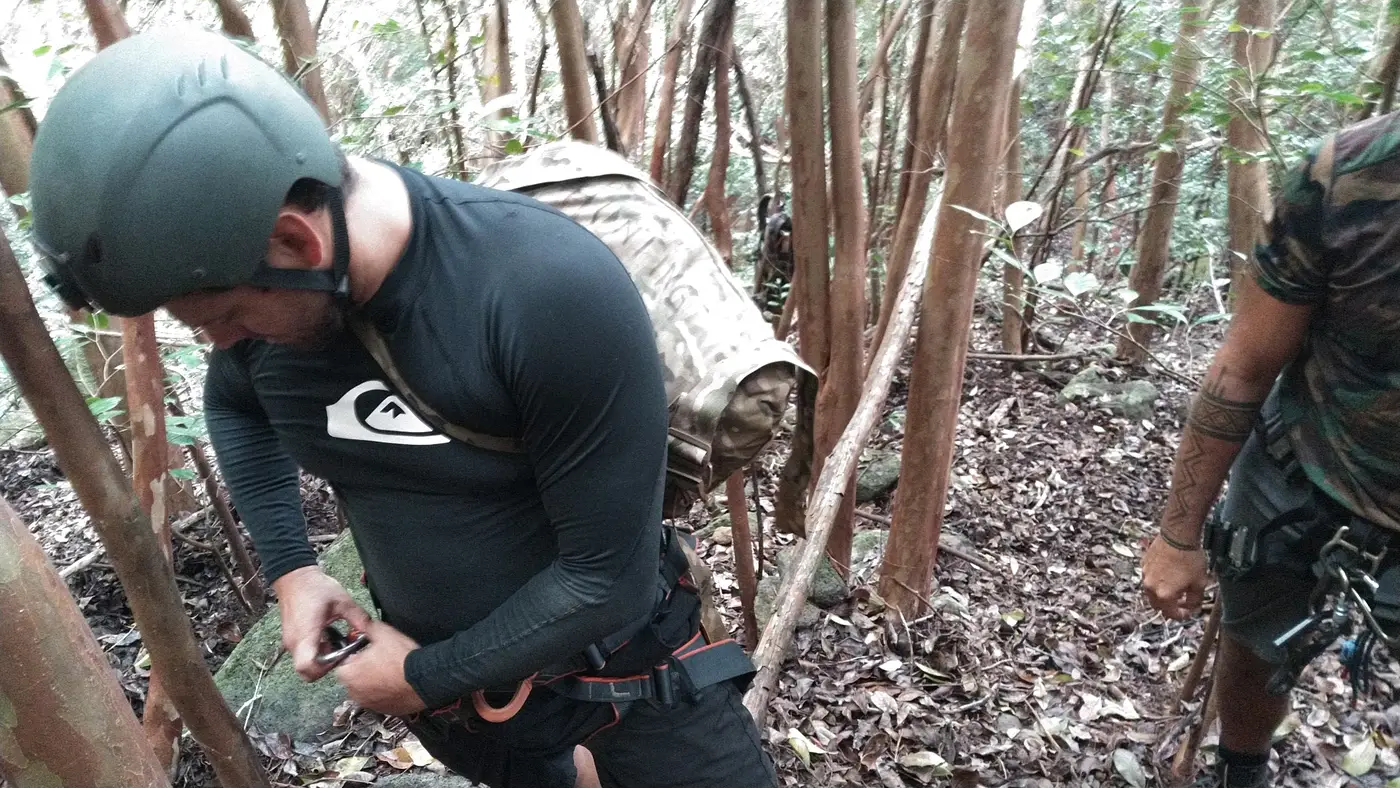 Pre-descent gear check in the forest